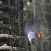 Fire and smoke rises from a destroyed building that was hit by a missile fired from Iran, in Tel Aviv, Israel on Friday, June 13,