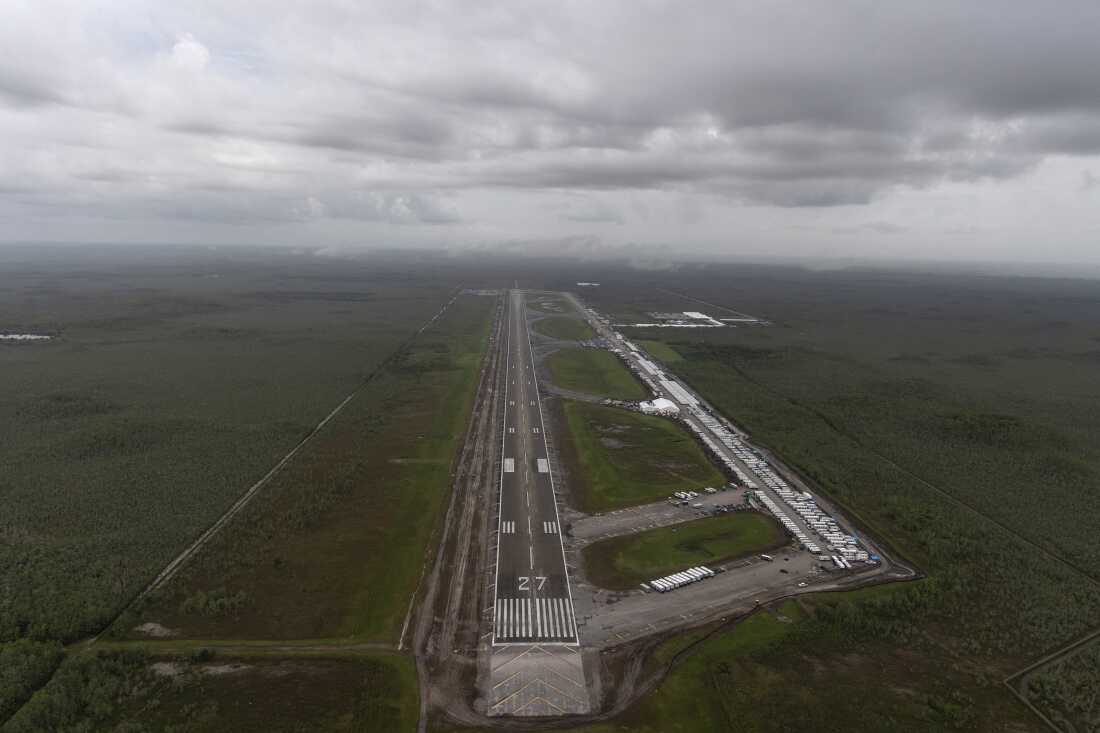 In an aerial view from a helicopter, the migrant detention center, dubbed "Alligator Alcatraz," is seen located at the site of the Dade-Collier Training and Transition Airport on July 4, 2025 in Ochopee, Fla. The site, located at an abandoned airfield in the Everglades wetlands, is part of the Trump administration's expansion of undocumented migrant deportations.