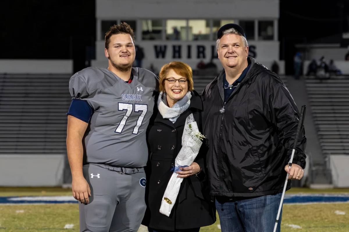 Scott Thornhill with his wife Jane and their son Will after Will's final high school game at Grimsley HS in Greensboro, NC.