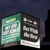 Advertisements for sports betting apps are seen in downtown Kansas City, Mo., in November.