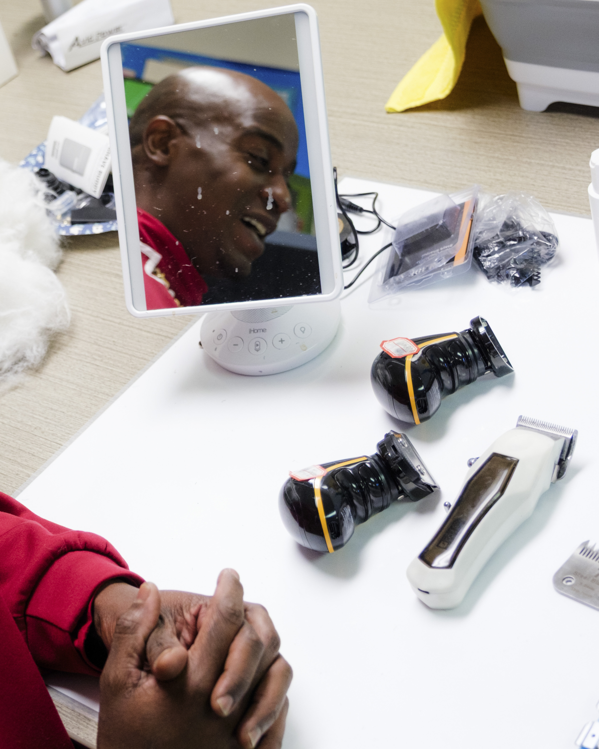 At this table, Esnard creates and tweaks new products for The Cut Buddy. But recent financial stress has left him little time for that.