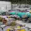 The U.S. Justice Department says Boeing has agreed to plead guilty to a criminal fraud charge stemming from the crashes of two 737 Max jets in 2018 and 2019. Boeing assembles its 737s at its factory in Renton, Wash.