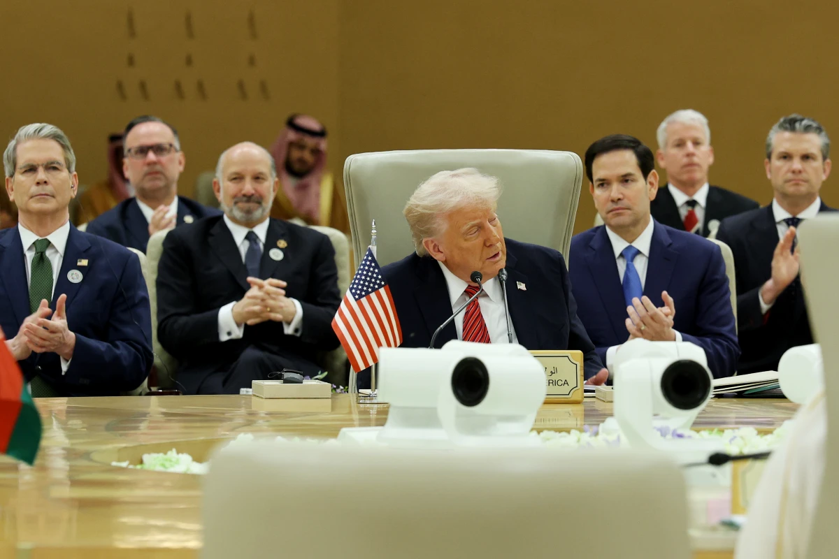 President Trump speaks with leaders at the Gulf Cooperation Council on May 14, 2025 in Riyadh, Saudi Arabia. He met briefly with Syria's interim President Ahmed al-Sharaa earlier on Wednesday.