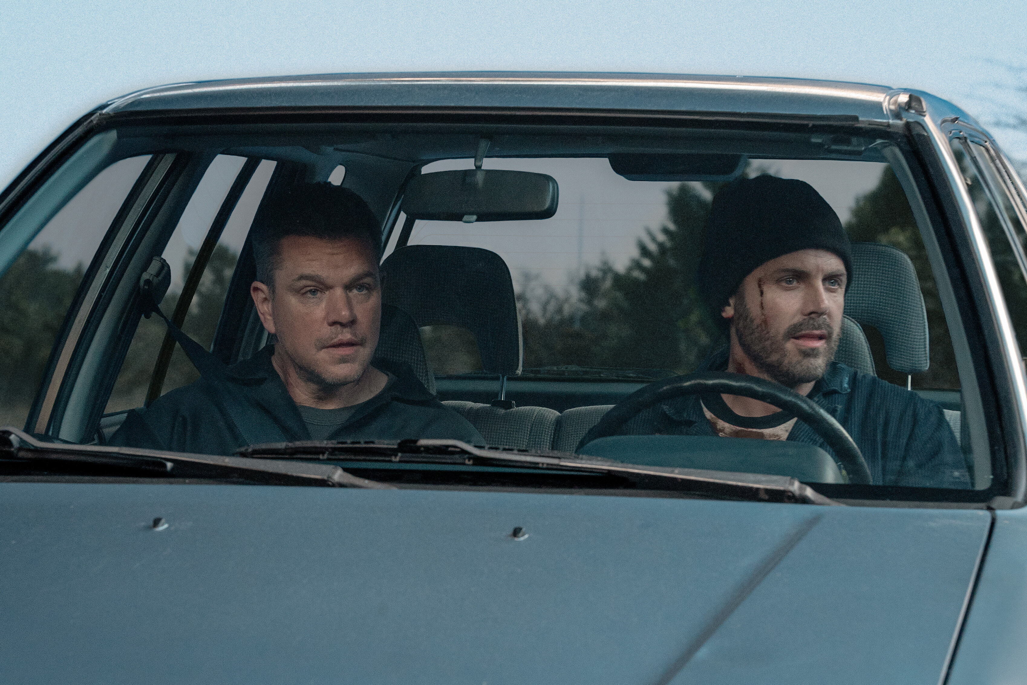 Matt Damon and Casey Affleck become uneasy partners in crime in <em>The Instigators.</em>