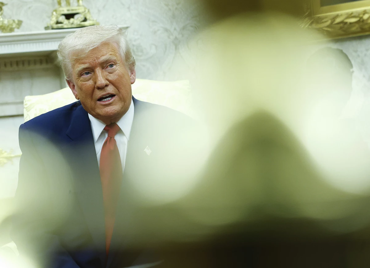 President Trump answers a reporters question during a meeting with Israeli Prime Minister Benjamin in the Oval Office of the White House on April 7.