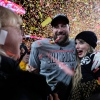 Donna Kelce stands with her son Kansas City Chiefs tight end Travis Kelce and Taylor Swift after the AFC Championship NFL football game against the Buffalo Bills on Jan. 26 in Kansas City, Mo.
