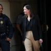 Maurene Comey (R), daughter of former FBI Director James Comey, departs a courthouse in October 2025 in Alexandria, Va.