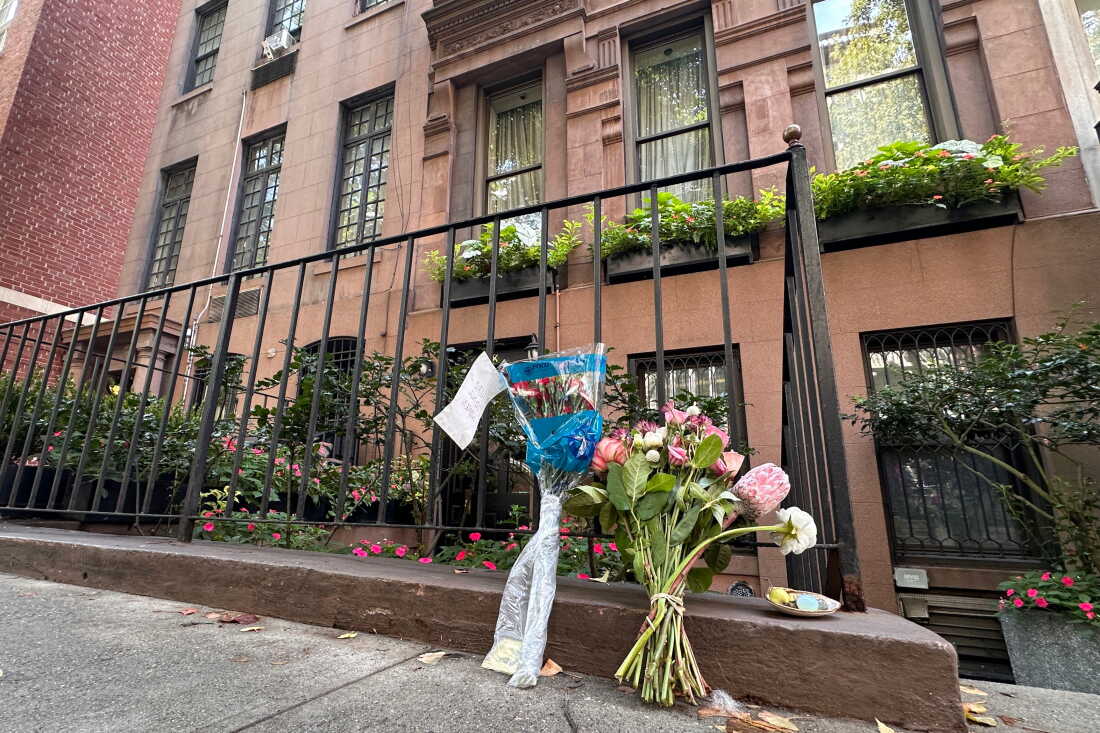 Flowers rest outside of Gloria Steinem’s Manhattan apartment, as seen on Thursday.