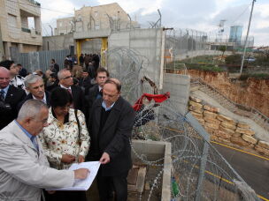 Nobel Peace Prize laureate Navi Pillay, then U.N. High Commissioner for Human Rights, visits a Palestinian family home near Ramallah in the Israeli-occupied West Bank on Feb. 7, 2011.