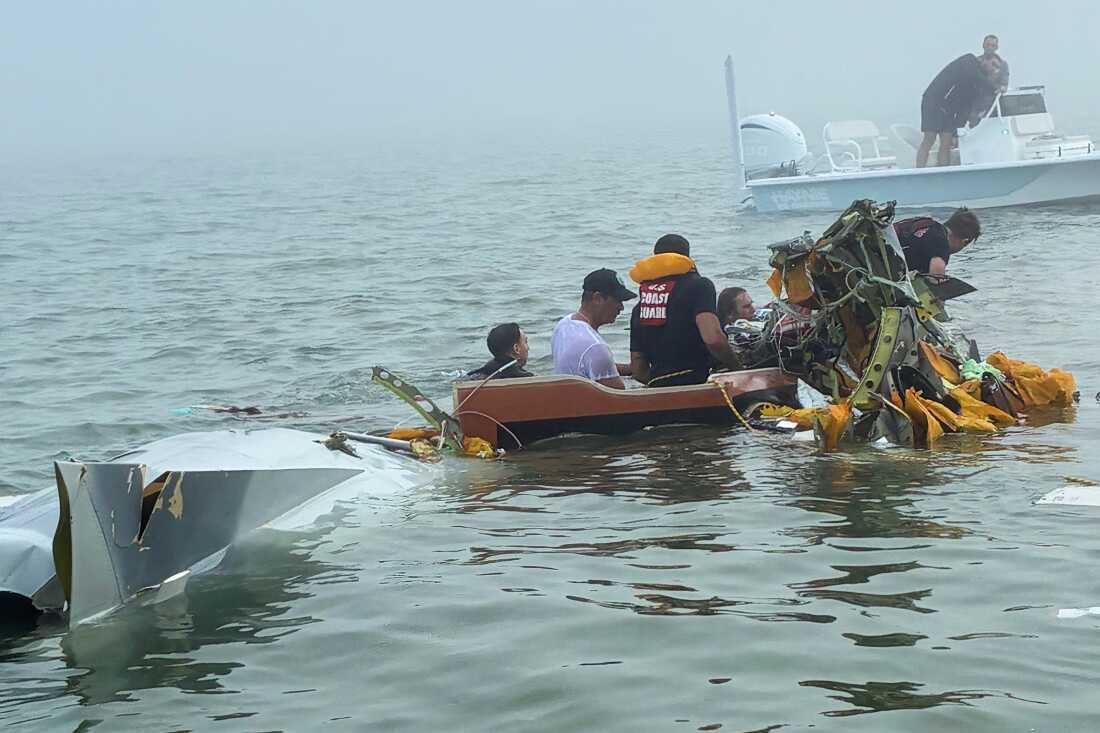 In this image provided by Sky Decker Jr., authorities and volunteers respond to a Mexican Navy plane crash near Galveston, Texas, Monday, Dec. 22, 2025.