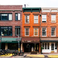 Small business owners across the U.S. are crunching numbers how to cover new costs from new tariffs on virtually all imports.