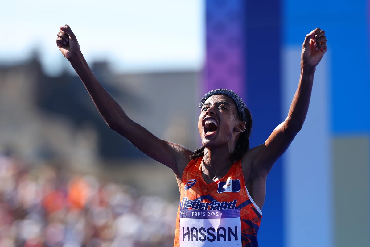 Sifan Hassan of the Netherlands celebrates after winning the women's marathon on Sunday at the Paris Olympics. She also won the bronze medal in both the 5,000- and 10,000-meter races. A remarkable Olympic running trifecta.