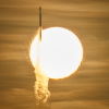 A SpaceX Falcon Heavy rocket with NASA’s Nancy Grace Roman Telescope on board is seen transiting the sun during its Aug. 30 launch from NASA’s Kennedy Space Center in Florida. The Roman telescope, named after the agency’s first chief astronomer, will help scientists study dark energy, exoplanets and the evolution of the universe.