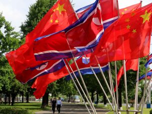 A street is decorated with the flags of China and North Korea in Pyongyang, on Monday, June 8, 2026.