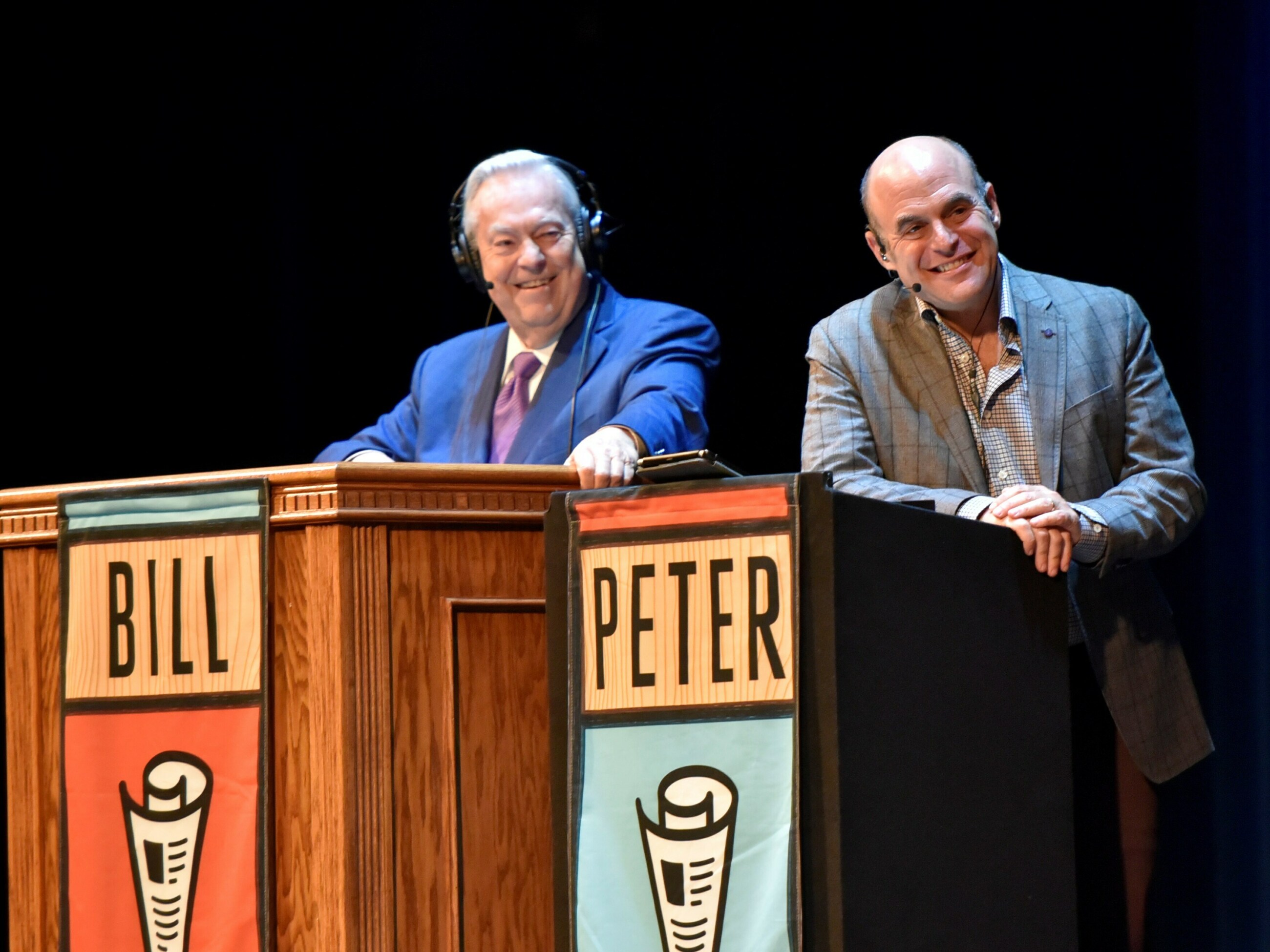 Hosts Peter Sagal and Bill Kurtis