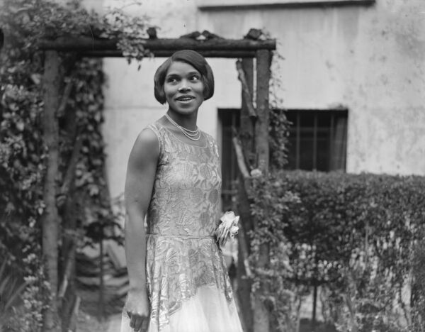 Marian Anderson poses for a photo outside.