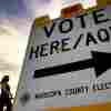Voters walk to a polling station in Tempe, Ariz., in November 2020.