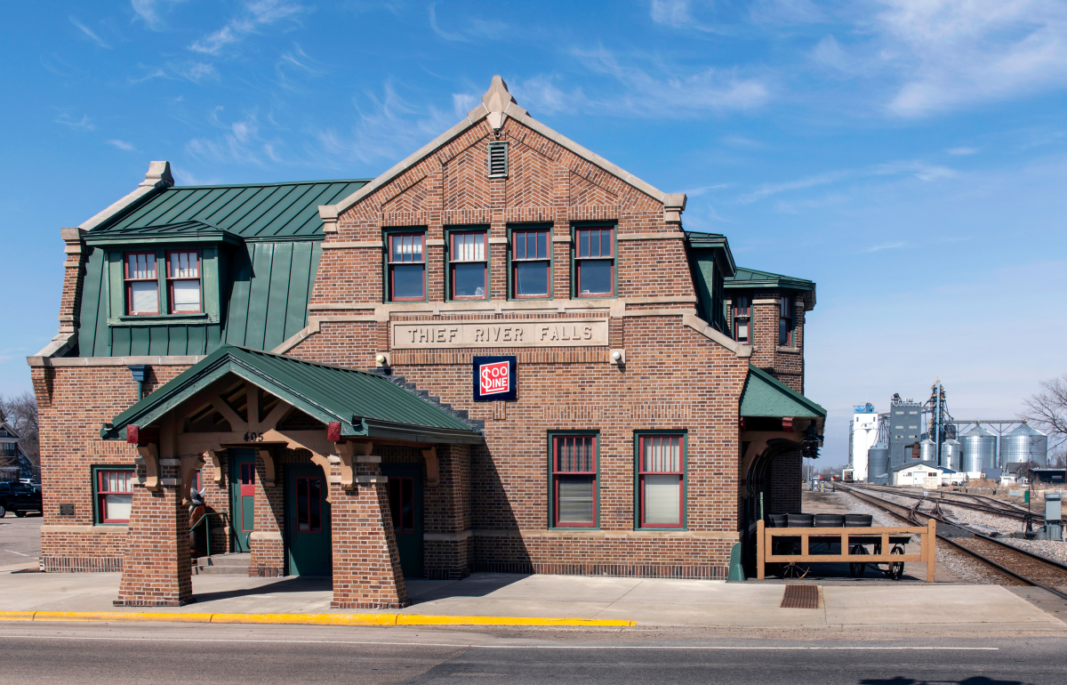 Built in 1914, the historical Soo Line Railroad Depot in Thief River Falls was renovated by the town in the 1990s to serve as City Hall. Along the train track is also the town's grain elevator.