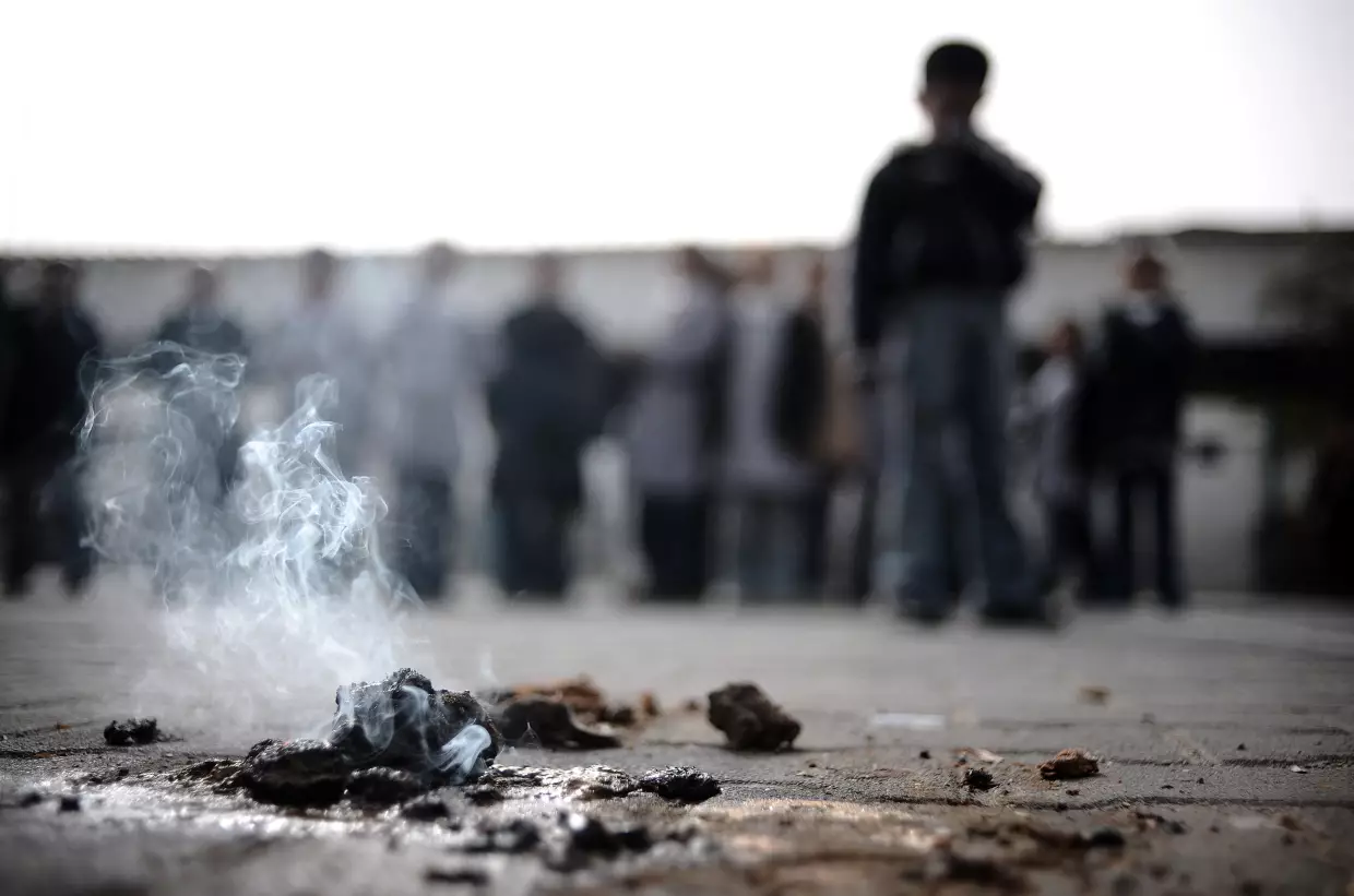 A piece of alleged white phosphorus still burns at UNRWA's (UN Relief and Works Agency) primary school in Beit Lahia in the northern Gaza Strip on January 24, 2009.