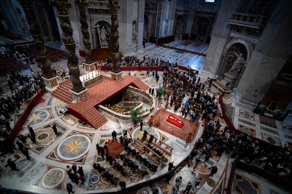 People line up to pay their respects as Pope Francis lay in state inside St. Peter's Basilica.