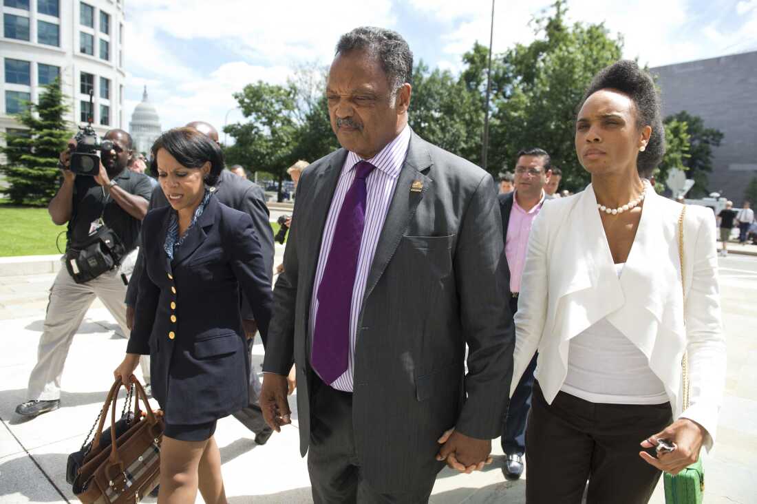 Rev. Jesse Jackson Sr. walks away after speaking to the media following a sentencing hearing for his son, former Illinois Congressman Jesse Jackson Jr., and his wife, Sandi Jackson, at the U.S. District Court in Washington, DC, on Aug. 14, 2013. Jackson Jr. was sentenced today to 30 months behind bars and his wife, Sandi, got a year in prison for separate felonies involving the misspending campaign funds.