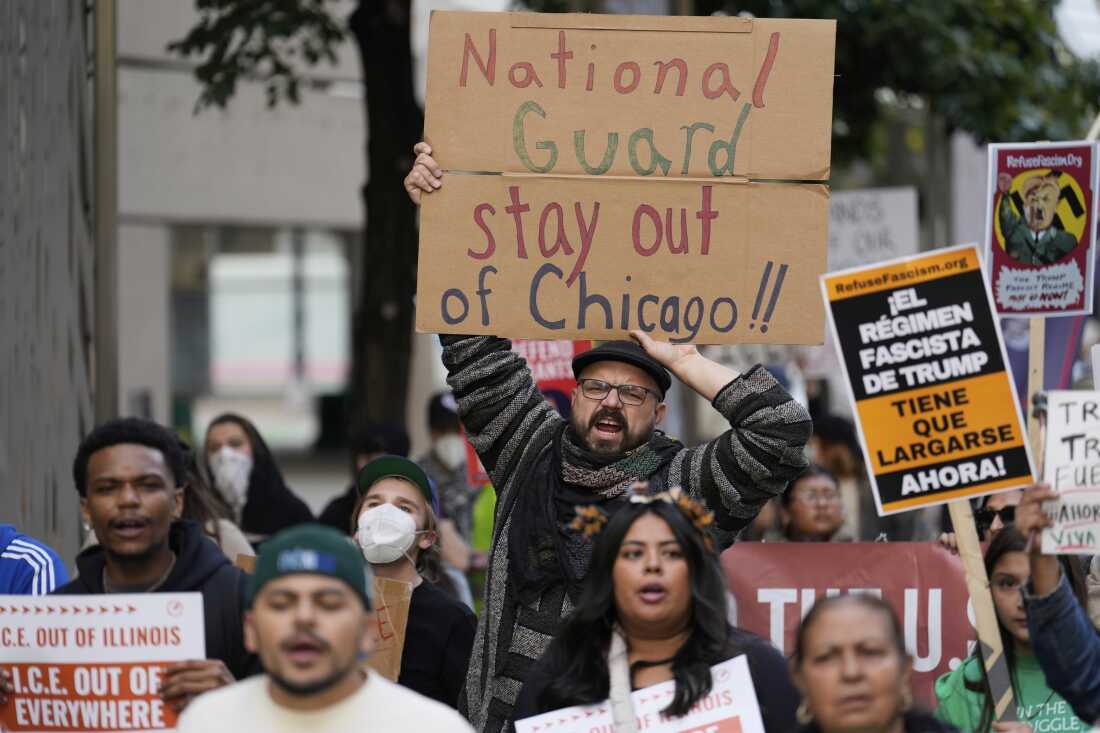 People march during Illinois Coalition for Immigrant & Refugee Rights' "Chicago Says No Trump No Troops" protest Saturday, Sept. 6, in Chicago.