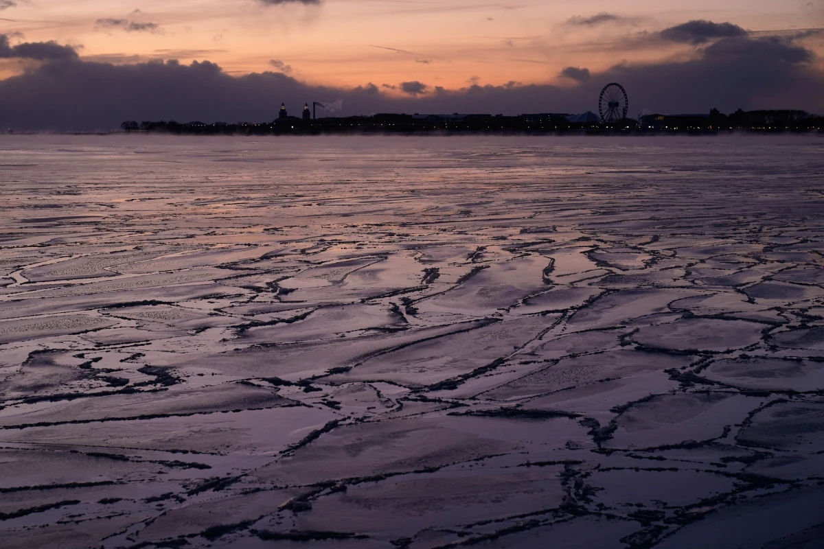 Ice forms along the shore of Lake Michigan on Jan. 23, 2026, in Chicago.