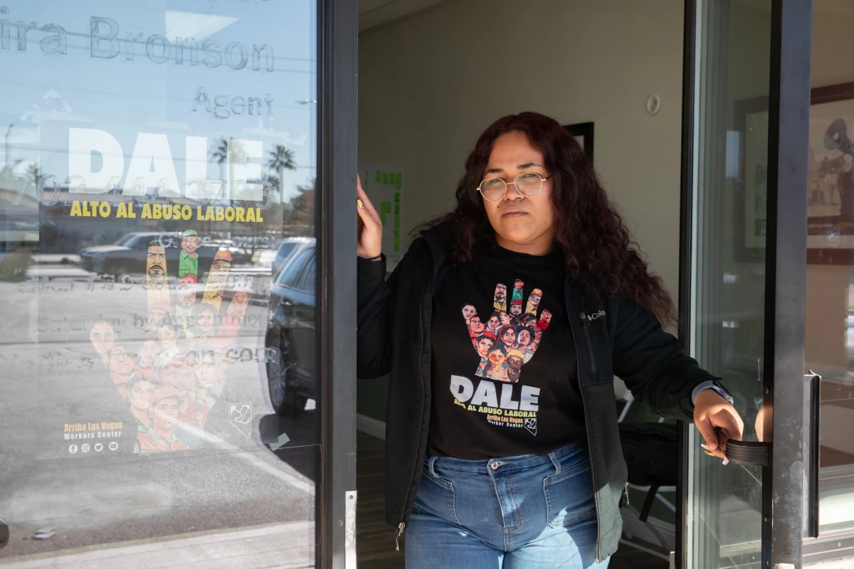 Labor organizer Karin Martinez stands in the doorway at the Arriba Las Vegas Worker Center in Las Vegas, Nev., on January 13, 2025.