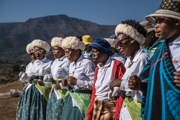 Community members perform a dance and song in the village in Leribe, Lesotho, Oct. 2, 2024.