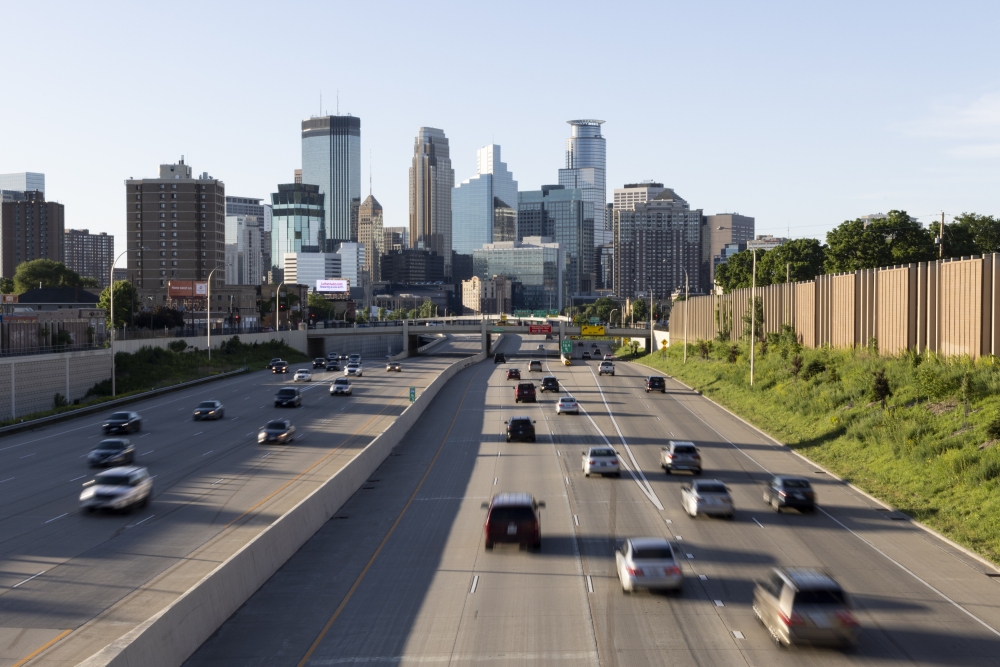 Vehicles drive toward downtown Minneapolis on Interstate 35 on a Sunday in May.