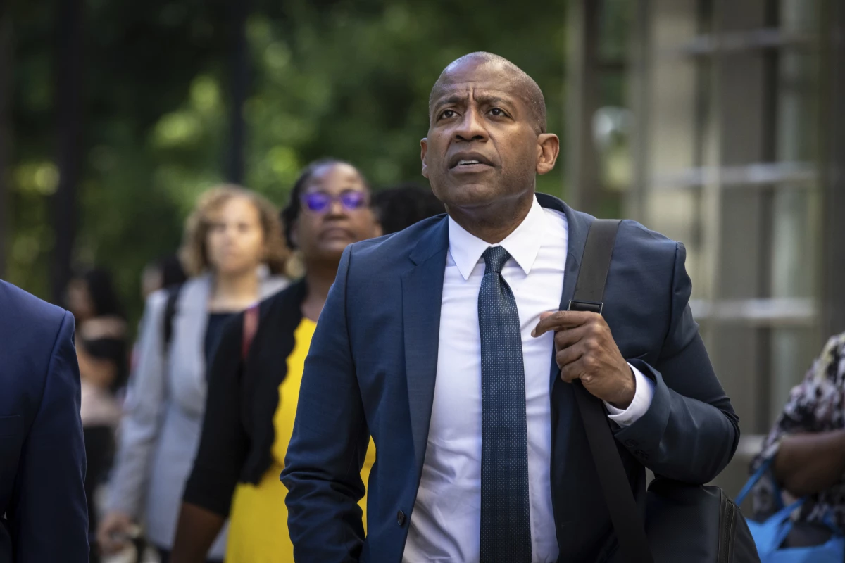 FILE - Carlos Watson leaves Brooklyn federal court after testifying in his own defense in New York, July 1, 2024.