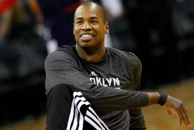 Brooklyn Nets center Jason Collins warms up before an NBA basketball game in New Orleans, March 24, 2014.