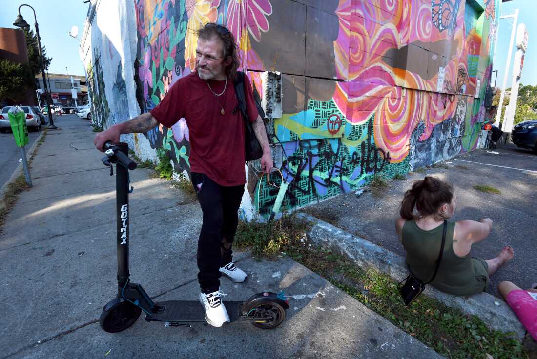 Kevin Donaldson, who lives with addiction, shown on a street corner in Burlington, Vermont, on September 16, 2024. He said members of his community have learned better ways to look out for each other as illicit drugs have grown more toxic.