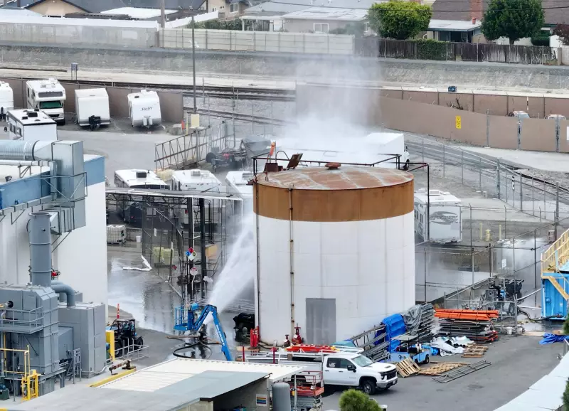 Water is sprayed on a tank that overheated at an aerospace plant in Garden Grove, Calif., on Friday.