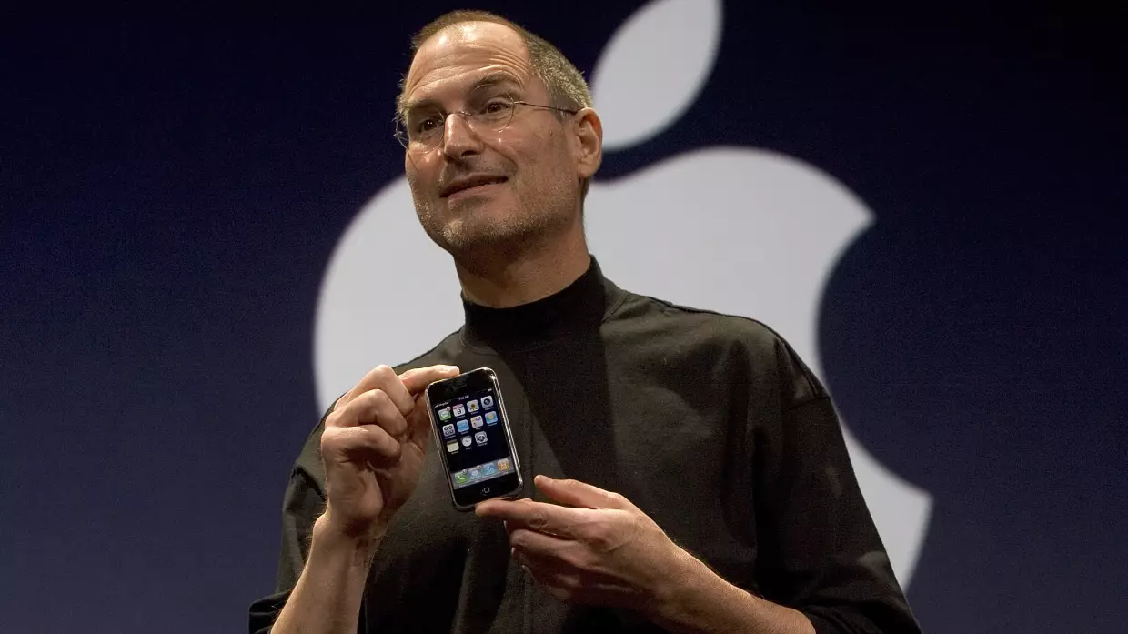 Apple CEO Steve Jobs unveils the iPhone in 2007.  A new working paper suggests the spread of smartphones helps explain the persistent decline in birth rates in the nearly two decades since.