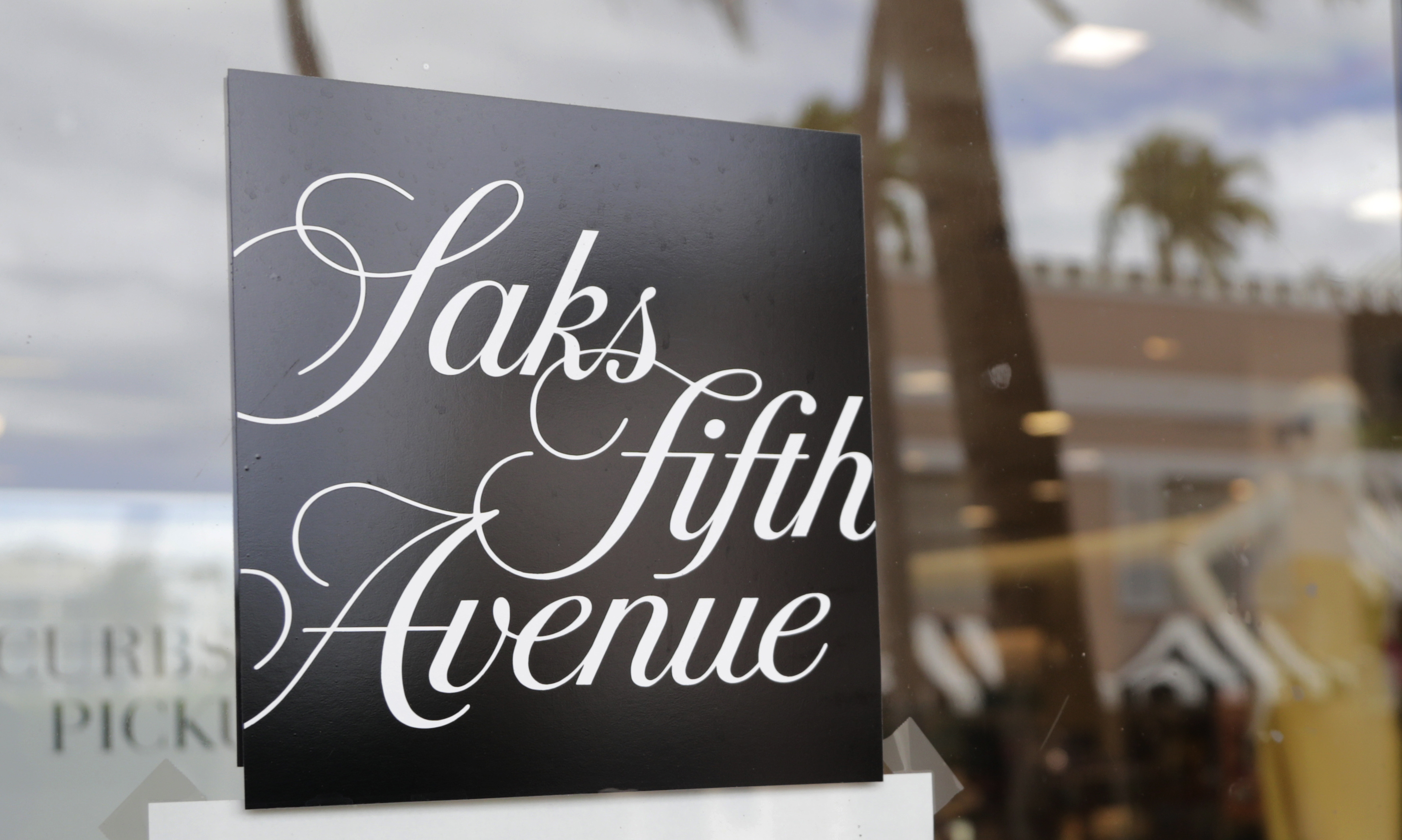 The parent company of Saks Fifth Avenue has agreed to buy rival luxury department store Neiman Marcus.