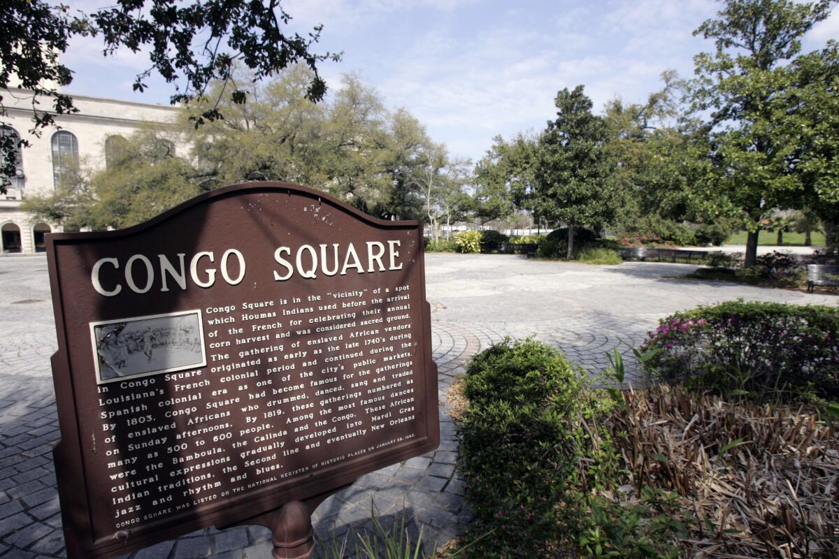 A sign at New Orleans' Congo Square commemorating the site's historical importance, captured shortly after the marker was posted in 2008.
