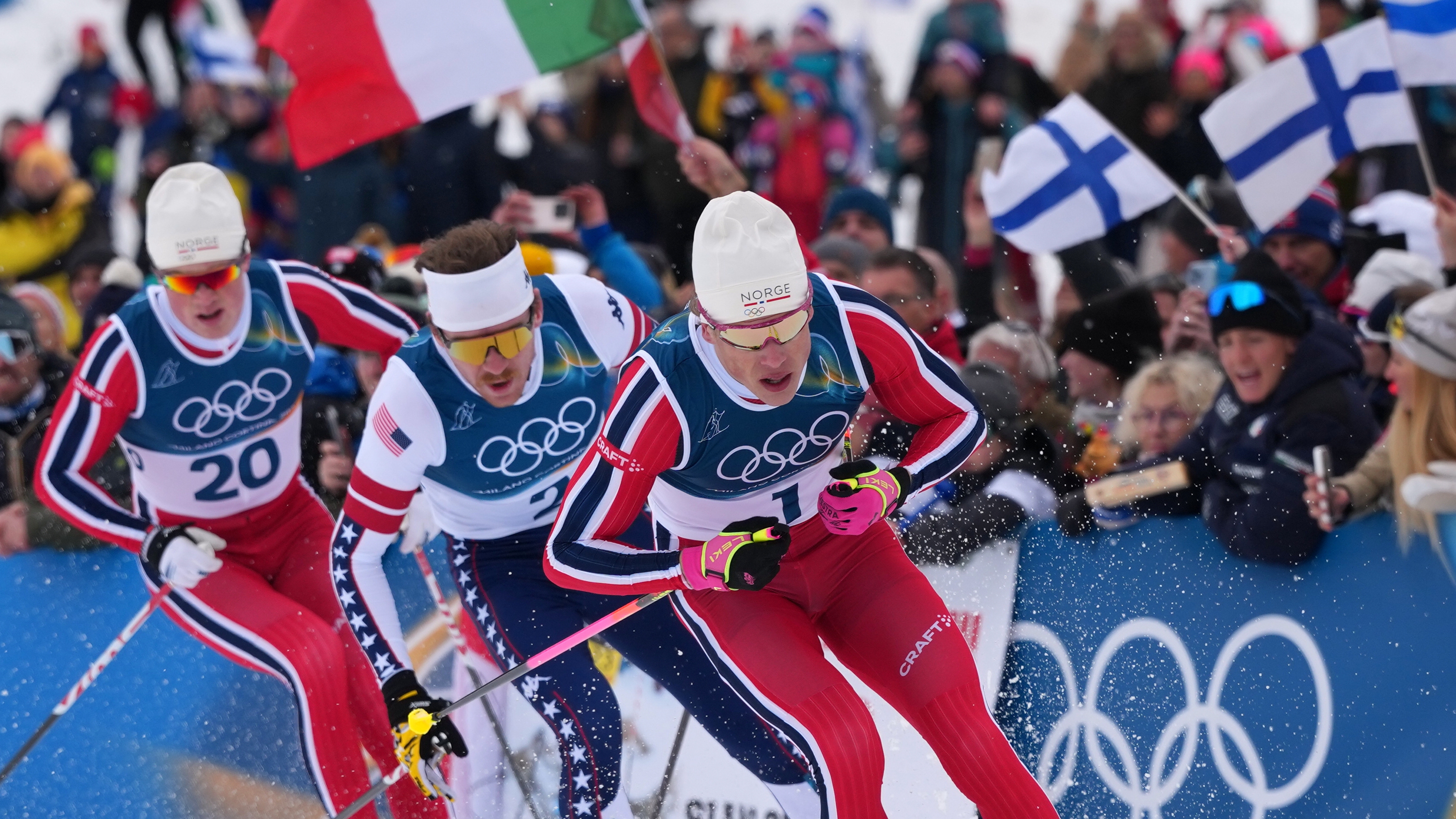 Johannes Hoesflot Klaebo, of Norway, from right, Ben Ogden, of the United States, and Oskar Opstad Vike, of Norway, compete in the final of the cross-country skiing men's sprint classic at the 2026 Winter Olympics, in Tesero, Italy, Tuesday, Feb. 10, 2026 (AP)