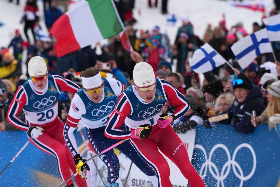 Johannes Hoesflot Klaebo, of Norway, from right, Ben Ogden, of the United States, and Oskar Opstad Vike, of Norway, compete in the final of the cross-country skiing men's sprint classic at the 2026 Winter Olympics, in Tesero, Italy, Tuesday, Feb. 10, 2026