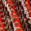 Three rows of cardinals dressed in red and white look on as the body of Pope Francis is transferred into the Basilica at St Peter’s Square in Vatican City on Wednesday.