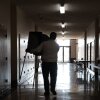 A staffer with the Kenosha County clerk's office sets up voting booths on Oct. 21, 2024, in preparation for in-person early voting in Kenosha, Wis.