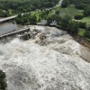 Heavy rains cause high water levels at the Rapidan Dam near Mankato, Minn., on Monday, June 24, 2024. Officials say the dam is threatened with “imminent failure.”