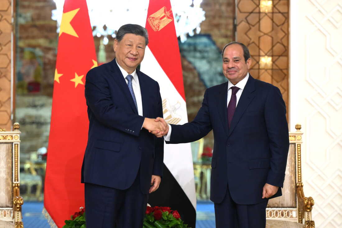 In this photo released by Xinhua News Agency, visiting Chinese President Xi Jinping, left, shakes hands with Egyptian President Abdel-Fattah el-Sissi prior to their meeting in Cairo, Egypt, Wednesday, Sept. 2, 2026.