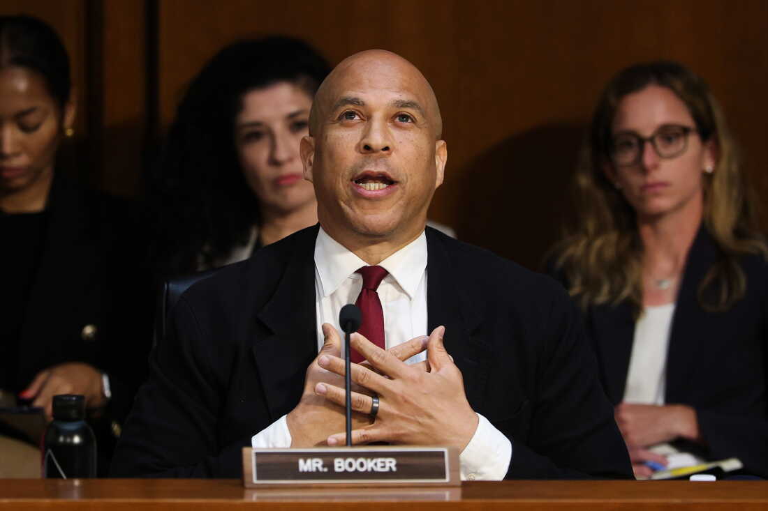 U.S. Sen. Cory Booker played tight end at Stanford from 1987 to 1990, when college football's big money era was just getting started. Now the New Jersey Democrat is working to shape landmark college sports legislation.
