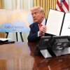 President Trump signs executive orders in the Oval Office on March 6, including the order terminating the security clearances of those who work at the law firm Perkins Coie.