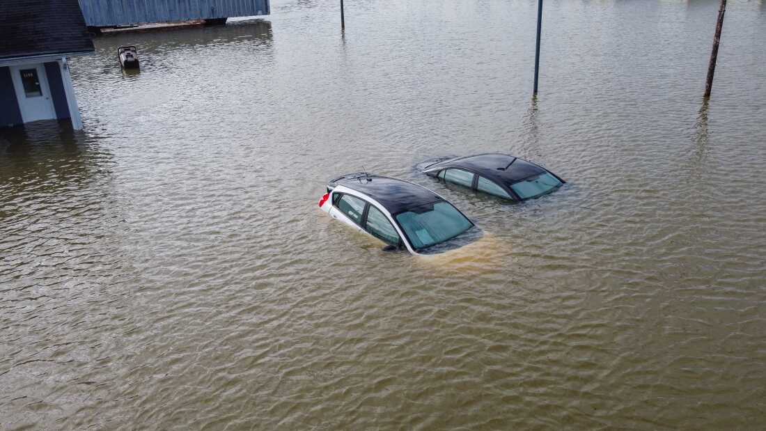 An aerial view of severe flooding in Frankfort, Kentucky on April 7, 2025, following days of heavy rainfall. Violent storms killed at least 17 people in the central-eastern United States. The storms came as the National Weather Service was grappling with 600 job cuts by the Trump administration. Now, the NWS has been given authorization to rehire more than 100 forecasters, radar technicians and others.