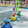 Competitors at the U.S. canoe and kayak cross slalom trials in Montgomery, Ala. float through the coarse in April 2024.