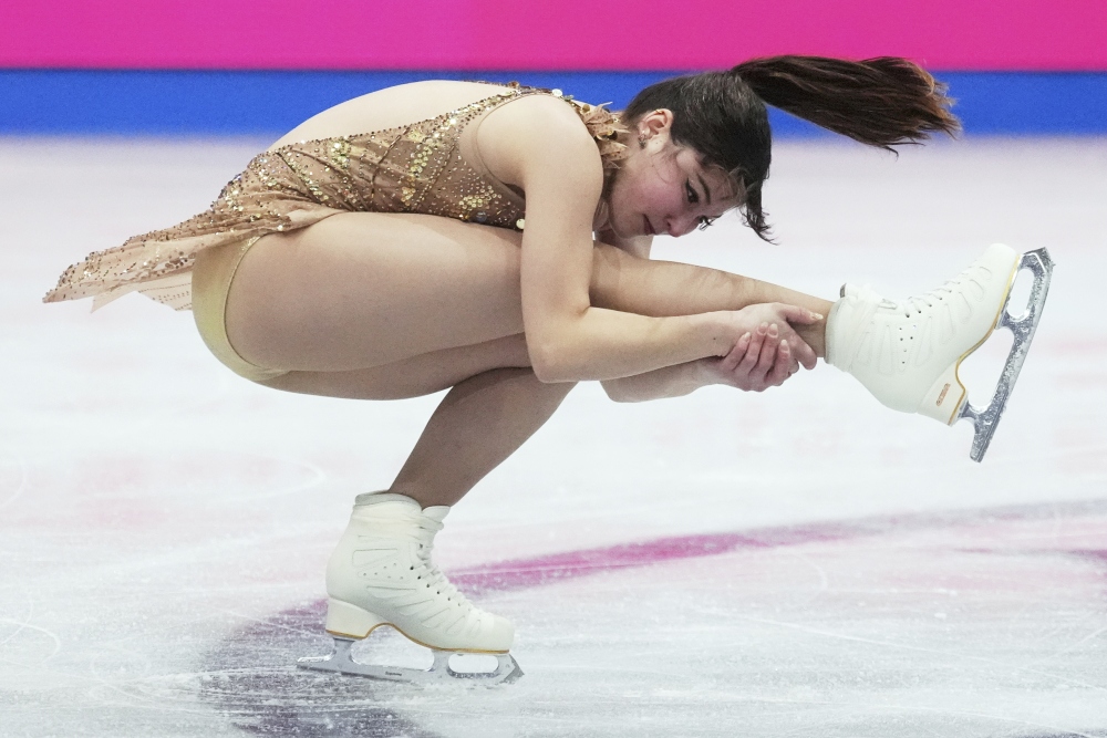 Alysa Liu, of the United States, performs during the women's free skating program at the figure skating world championships in Boston on Friday. (AP)