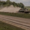 Ukrainian servicemen ride an armored fighting vehicle in the Sumy region, near Ukraine’s northeastern border with Russia on Sunday. Ukrainian troops in this area crossed into western Russia last week and have seized a large swath of territory.