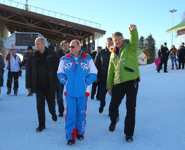 Russian President Vladimir Putin, center, once used the Olympic movement to burnish his country's reputation, hosting the 2014 Winter Games in Sochi. Plagued by doping scandals and accusations of war crimes, Russia and its athletes play a dwindling role in world sport. (AP Photo/RIA-Novosti, Mikhail Klimentyev, Presidential Press Service)